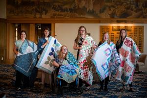 girls with quilts